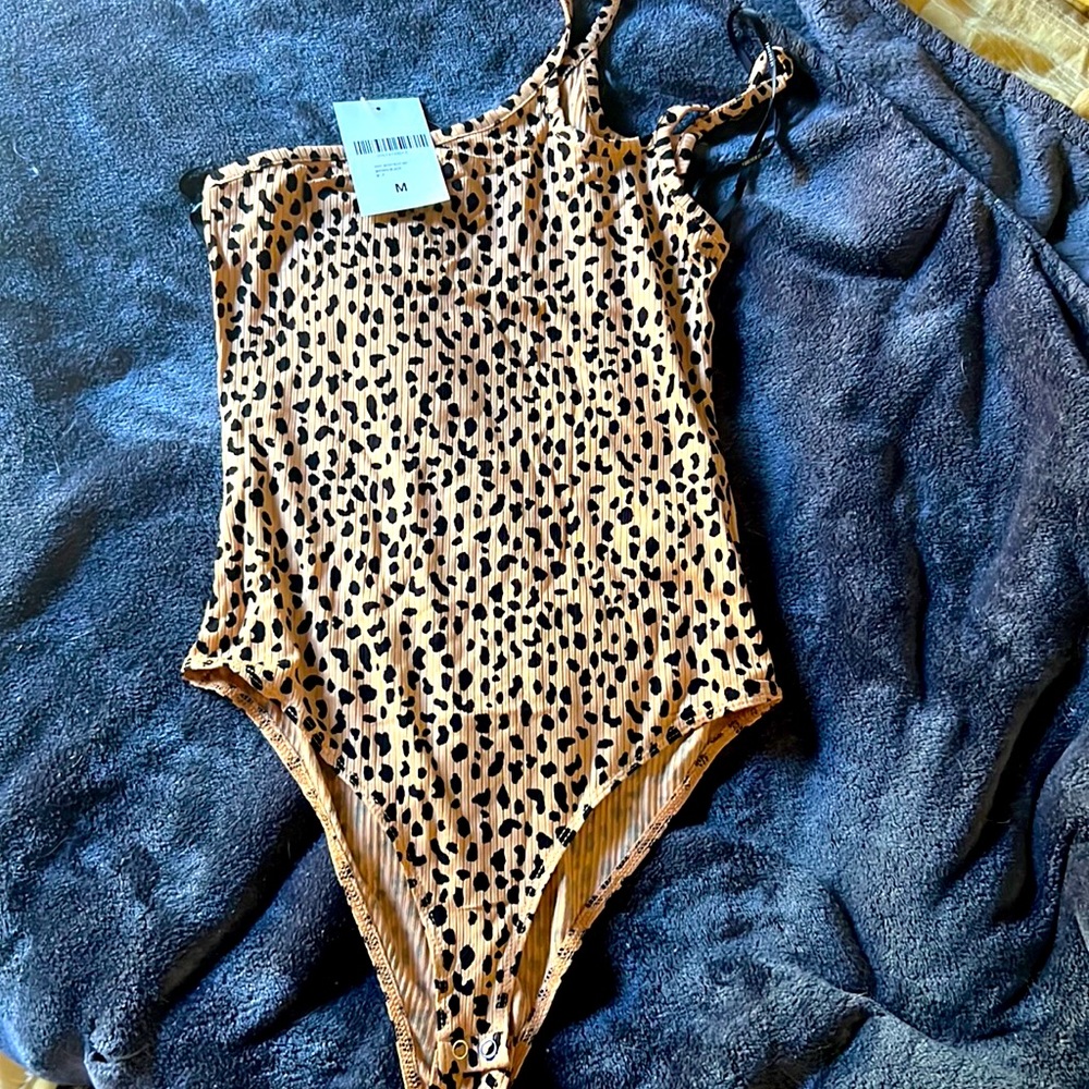 Tags still on, never worn. Medium, leopard print, body suit.